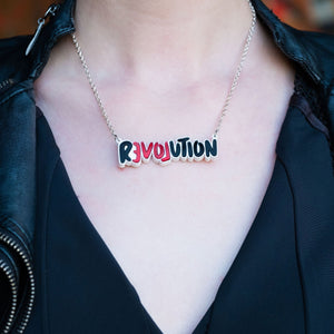 Person wearing Australian handmade Meaningful LOVE REVOLUTION Statement Necklace by Maine and Mara