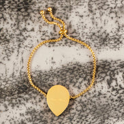 MEDUSA Gold drop-pendant Bracelet | Gold-Flecked Teal Marble