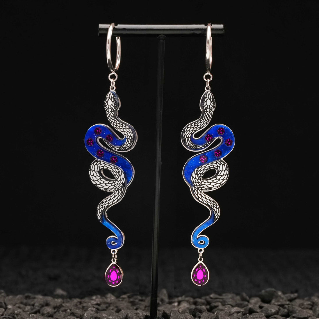 silver snake hoop earrings with purple gemstones and blue marble handmade on black background