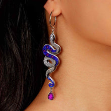 Load image into Gallery viewer, Snake hoop earring with blue and purple accents worn by a person
