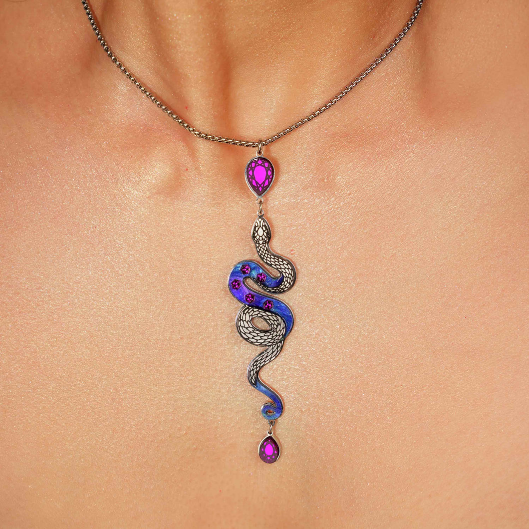 Necklace with a snake-shaped pendant on a person's neck