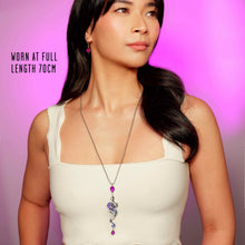 Load image into Gallery viewer, Woman wearing a necklace with a pink background