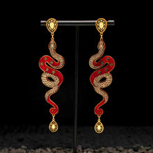 Load image into Gallery viewer, MEDUSA Gold Snake Dangle Earrings | Ruby Red