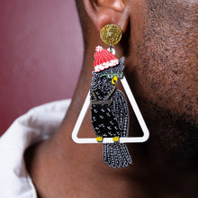 Load image into Gallery viewer, Person Wearing the Maine And Mara COCKIE COLLAB Australian Christmas Earrings in black