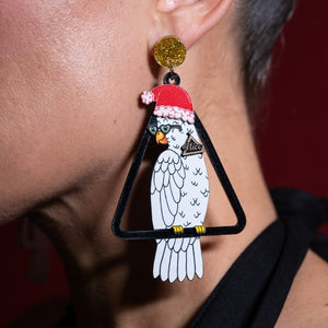 Person Wearing the Maine And Mara COCKIE COLLAB Australian Christmas Earrings in white