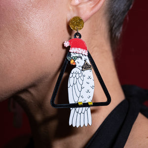 Person Wearing the Maine And Mara COCKIE COLLAB Australian Christmas Earrings in white