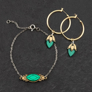 Handmade Maine And Mara Athena gold hoop earrings with emerald gem pendant and matching bracelet