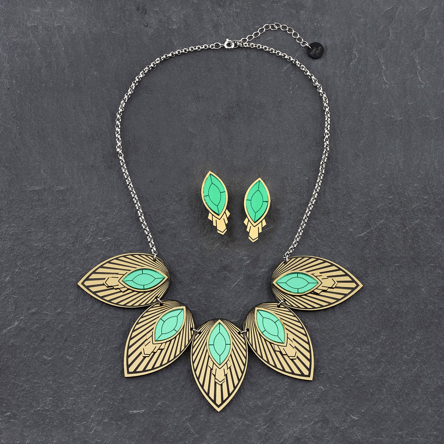 Unique gold necklace designs with emerald gems MAINE MARA