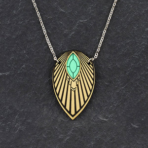 Closeup of the Maine and Mara ATHENA Emerald Green and Gold Art Deco Long Necklace Pendant