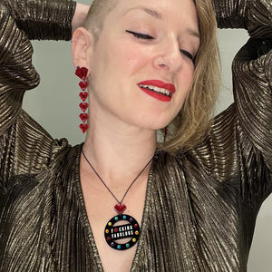 Person Wearing Australian Handmade Maine And Mara CROWN JEWEL NECKLACE And Ruby Red CROWN JEWEL DANGLES