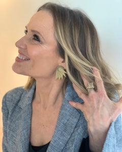 Happy Shaynna Blaze Wearing Brushed Gold Wings Statement Earrings, Handmade In Australia