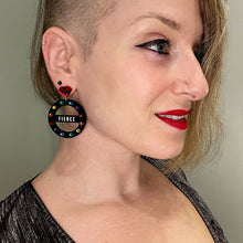 Load image into Gallery viewer, Person Wearing Personalised Fierce Maine And Mara CROWN JEWEL Rainbow Black Hoop Pride Earrings