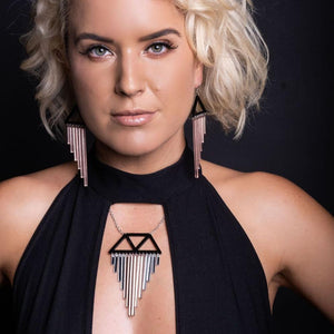 Person wearing Rose Gold Colour Pop Chimes Dangle Earrings and necklace handmade by Maine and Mara