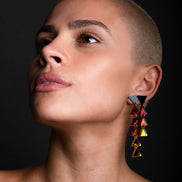 Person wearing Mismatched FLAMING ELEMENTAL ALCHEMY Triangle Earrings by Maine and Mara