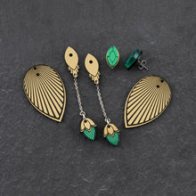 Load image into Gallery viewer, THE ATHENA emerald green gem and gold Earrings by Maine and Mara displayed in individual pieces with jackets
