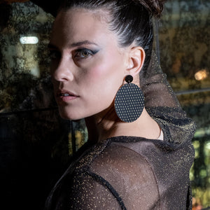 Person Wearing Large Black Oversized Maine And Mara PLUS SIDE Bold Round statement Earrings