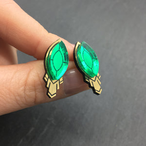 Person holding Maine and Mara handmade SMALL ATHENA Art Deco Stud Earringswith emerald gem