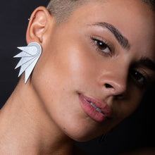Load image into Gallery viewer, Person wearing SPREAD YOUR WINGS Grande Art Deco Wings Clip-on Statement Earrings by Maine and Mara