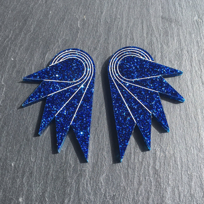 Pair of handmade Maine and Mara Jewellery SPREAD YOUR WINGS Studs in Glittery Navy Blue