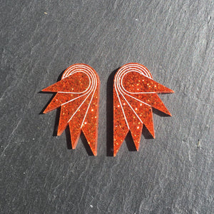 Pair of handmade Maine and Mara Jewellery SPREAD YOUR WINGS Studs in Glittery Burnt Orange