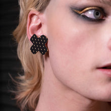 Load image into Gallery viewer, Closeup Of Australian Handmade Genderless Maine And Mara Large Black BISOUS KISS Statement Studs worn By Person