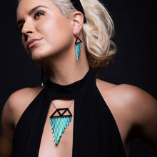 Load image into Gallery viewer, Person wearing Colour Pop Chimes Pendant Statement Necklace and Earrings in teal by Maine and Mara