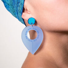 Load image into Gallery viewer, Closeup Of Person Wearing Handmade Maine And Mara RIGHT HERE, RIGHT NOW AQUA Dangle Statement Earrings